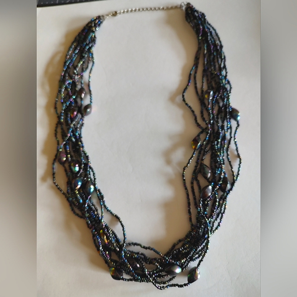 MULT COLORED IRIDESCENT BLACK/PURPLE BEADED MULTI-STRAND NECKLACE